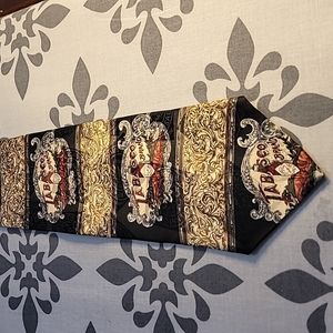 Tabasco Silk Tie with logo, Black, Silver, Red, and Gold accents.